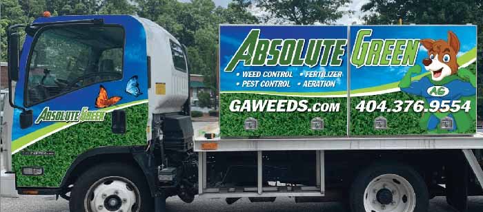 Absolute Green weed control and fertilizer trucks in Buford, GA